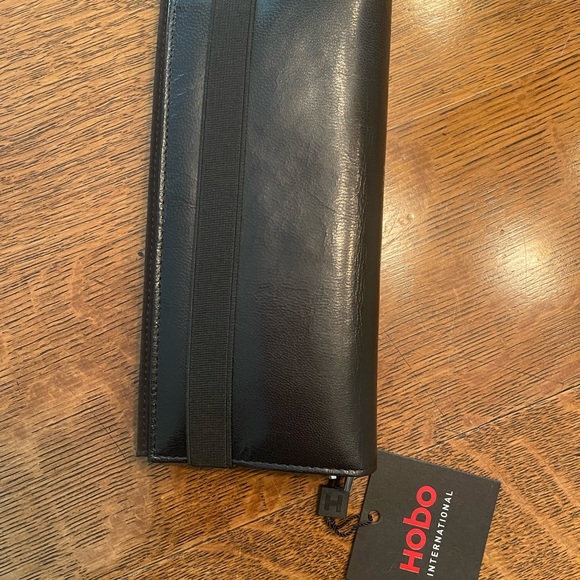 HOBO black leather wallet. NWT zippered pockets, cc slots. It’s kind of perfect. - Picture 7 of 7